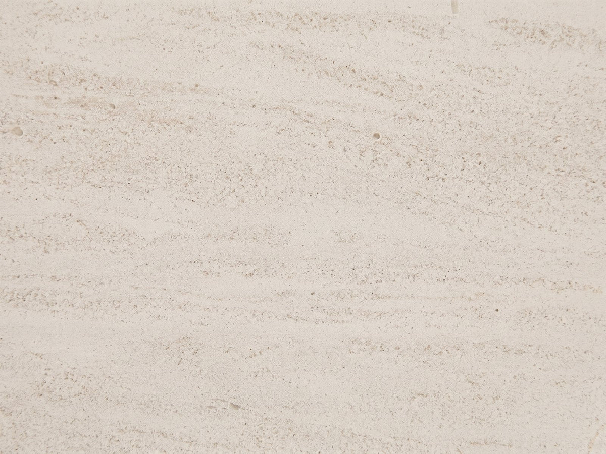 Close-up of the Alessano Rope Hourglass Side Table: the cream stone-look top in its rope ring