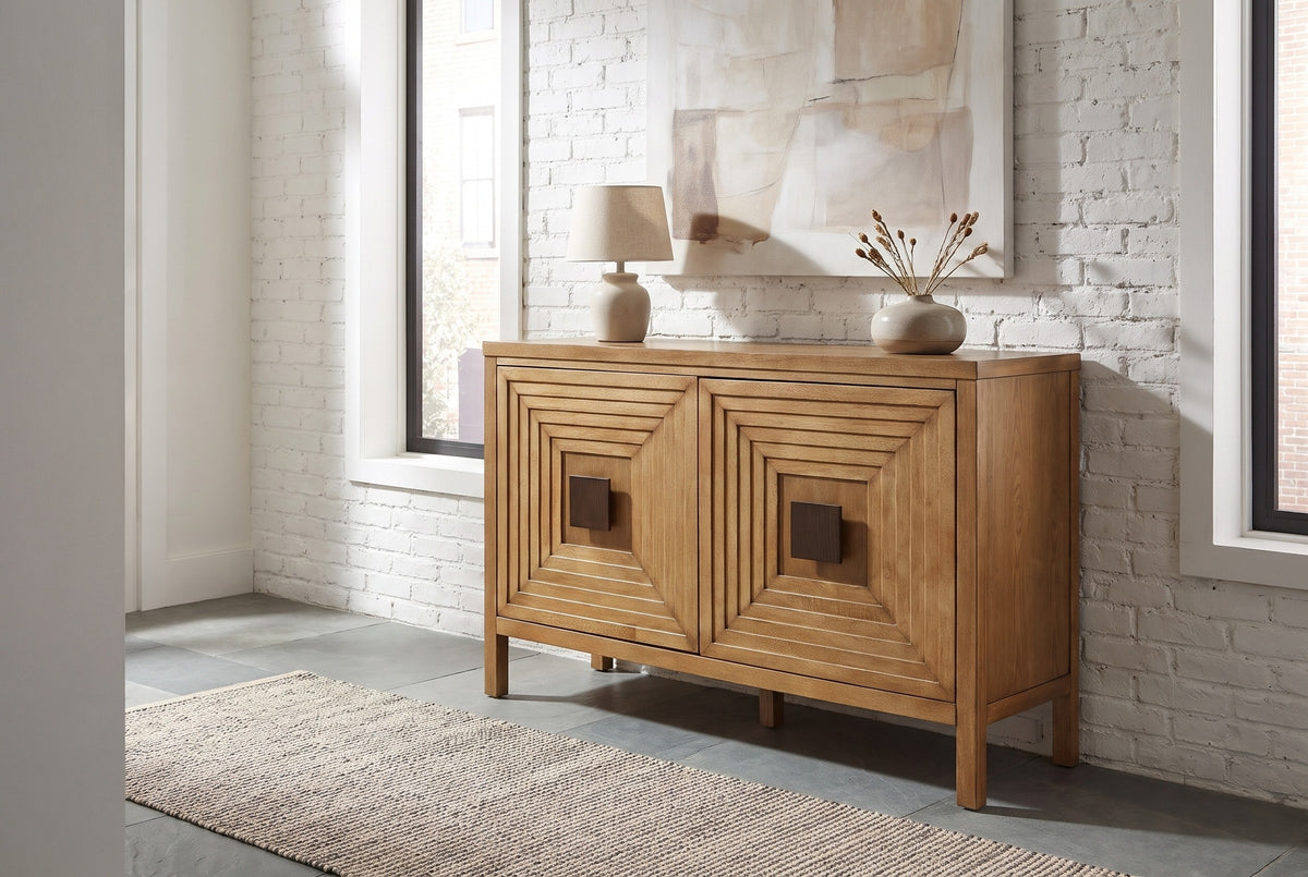 Altamura two-door sideboard against a white-painted brick wall in a Brooklyn entryway with a slate floor and a flat-weave runner