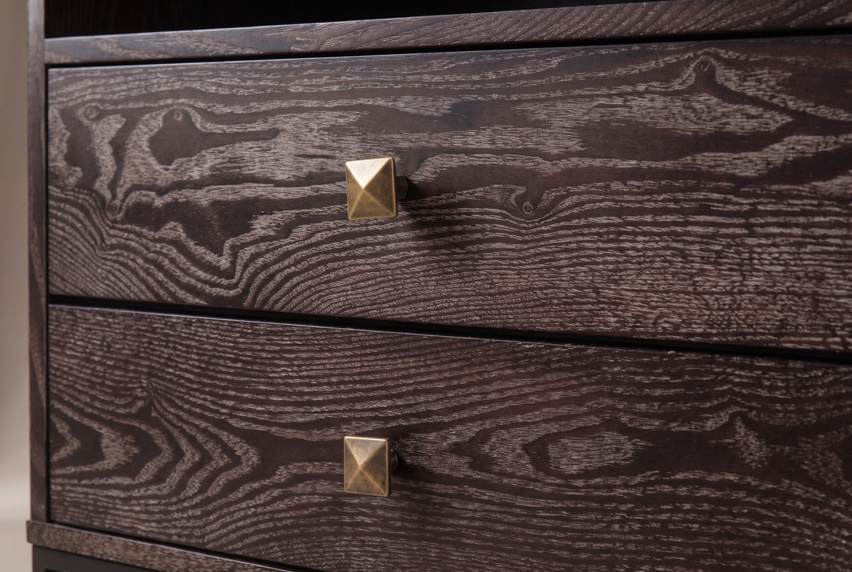 Two stacked drawer fronts of the Atella sideboard in dark espresso with white-limed grain, each with a centred antique-brass pyramid knob