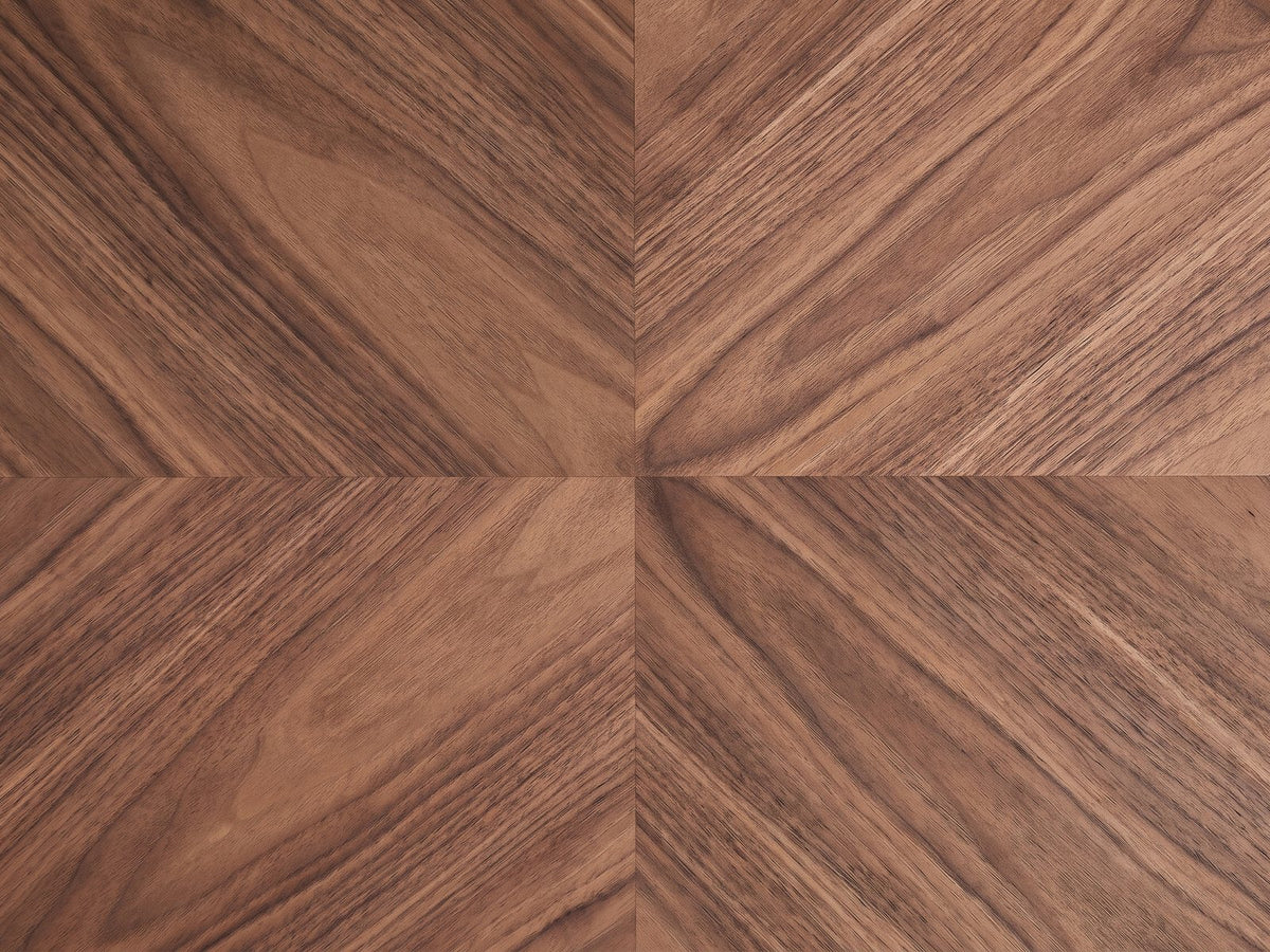 Close-up of the Bari Walnut Veneer Square Pedestal Coffee Table: the four-way matched walnut veneer at the centre of the top