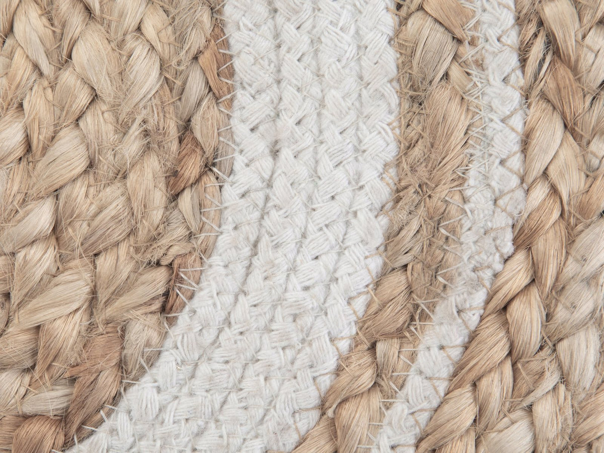 Close-up of the Bordighera Braided Jute and Cotton Round Pouf: the hand-braided jute top with its wide off-white cotton ring