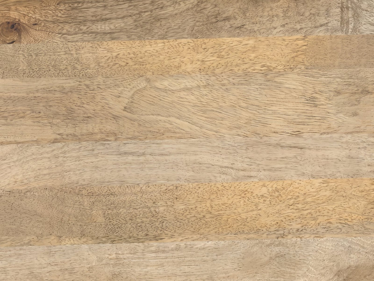 Close-up of the Camogli Mango and Black Metal Drum Coffee Table: the natural mango grain of the top