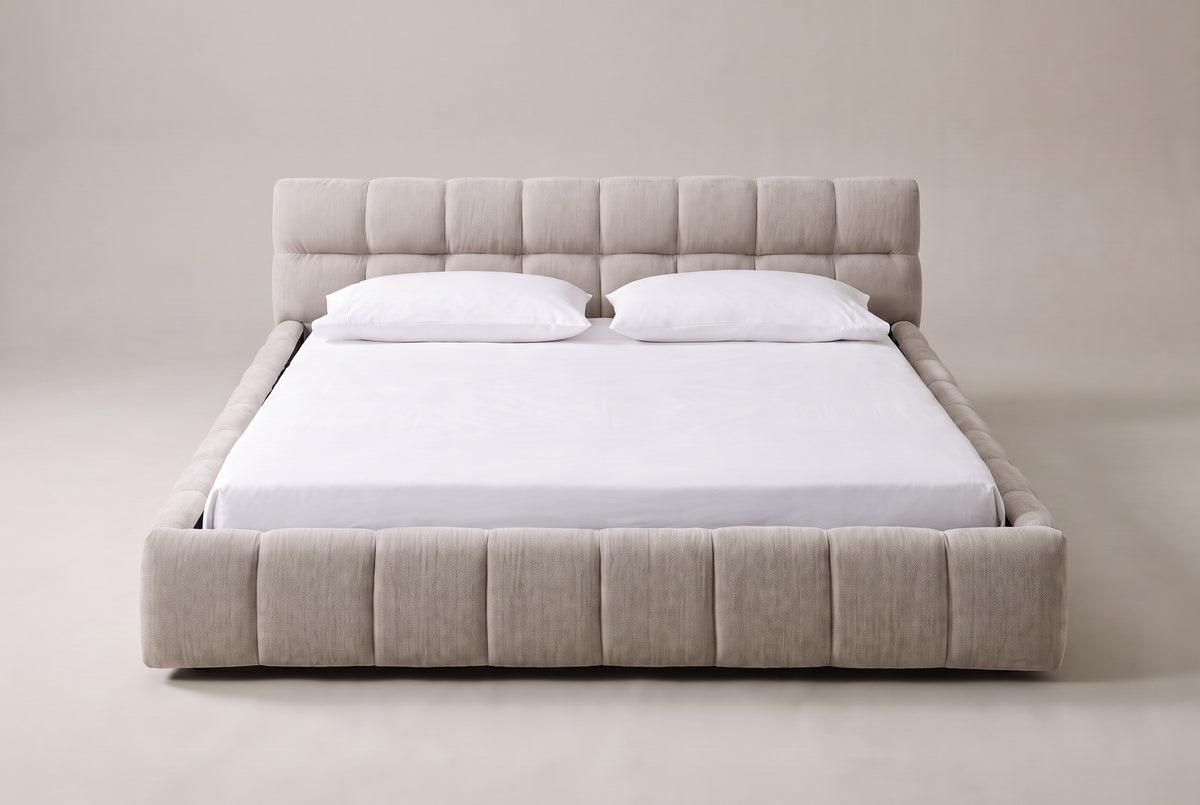 Capracotta floor bed in beige chenille with a white mattress and pillows (not included), front view