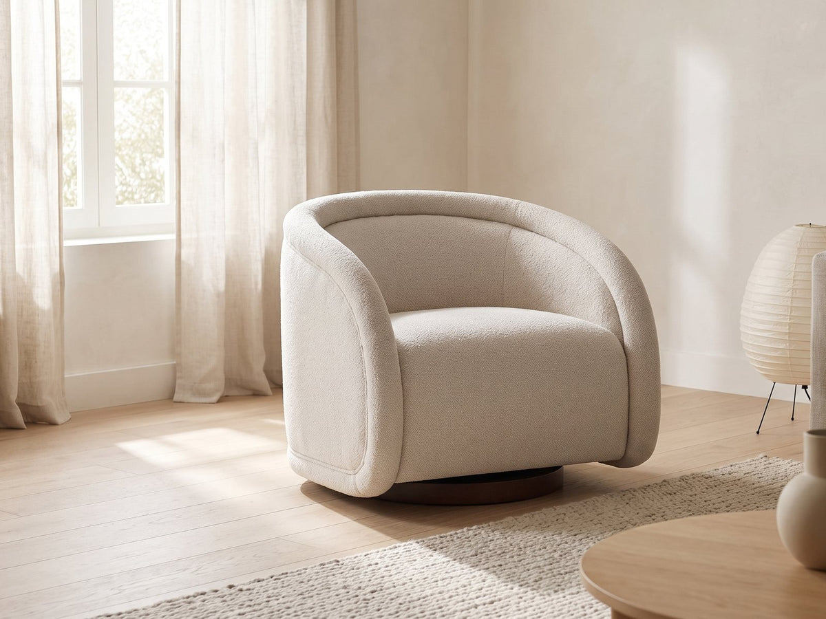 Carina swivel chair in a living room beside a sofa