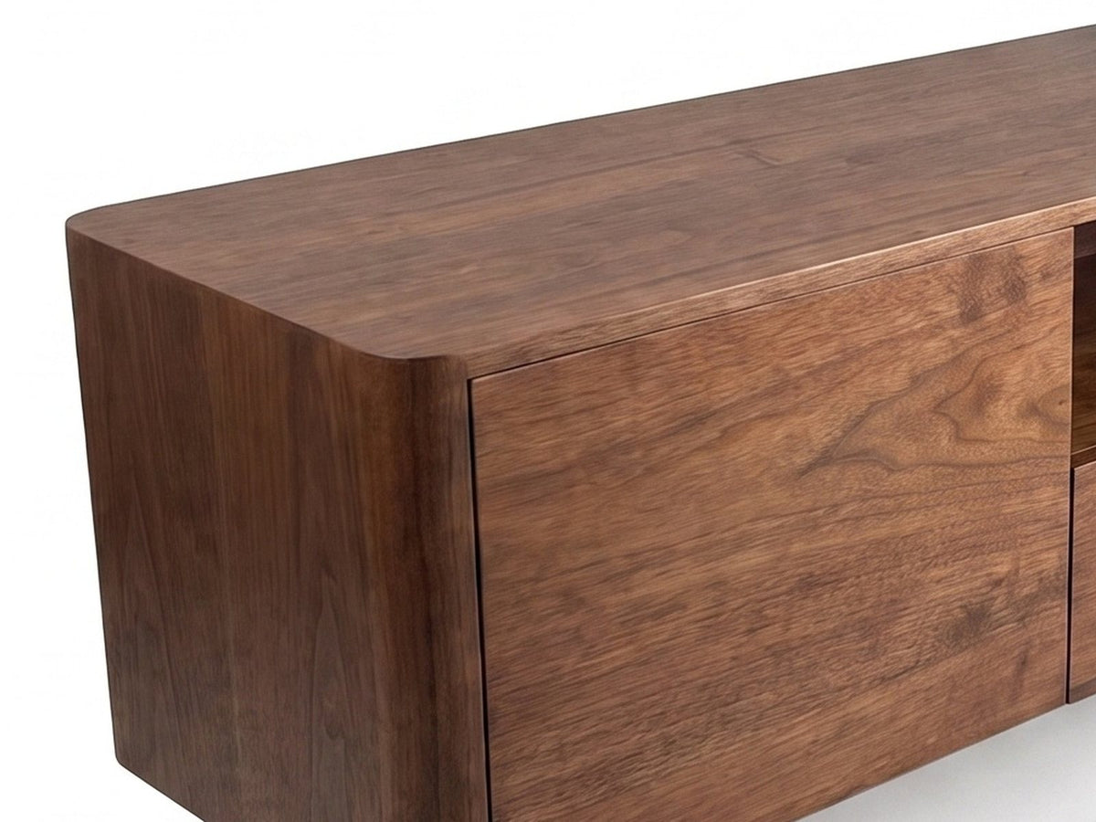 Close-up of the Cernobbio Curved Walnut Media Console: walnut veneer grain