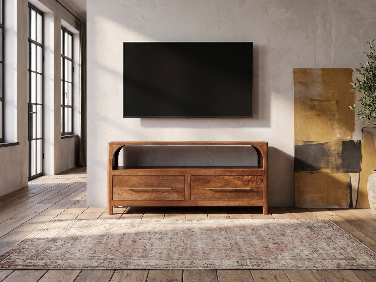 Cherasco Arch Mango Media Console under a wall-mounted screen in an industrial loft