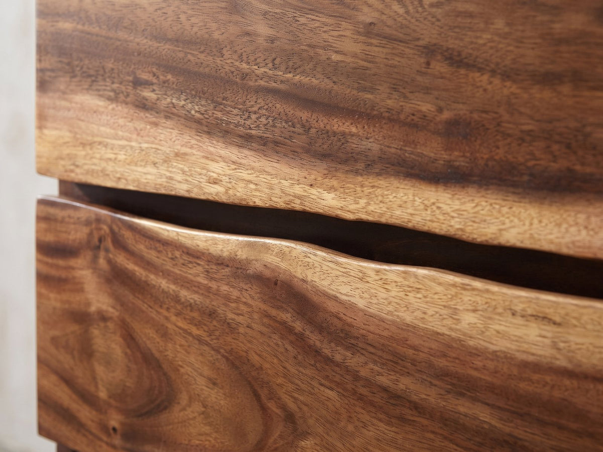 Close-up of the Chioggia 64-Inch Smokey Walnut 6-Drawer Dresser: the wavy live edge between two drawers over a dark reveal