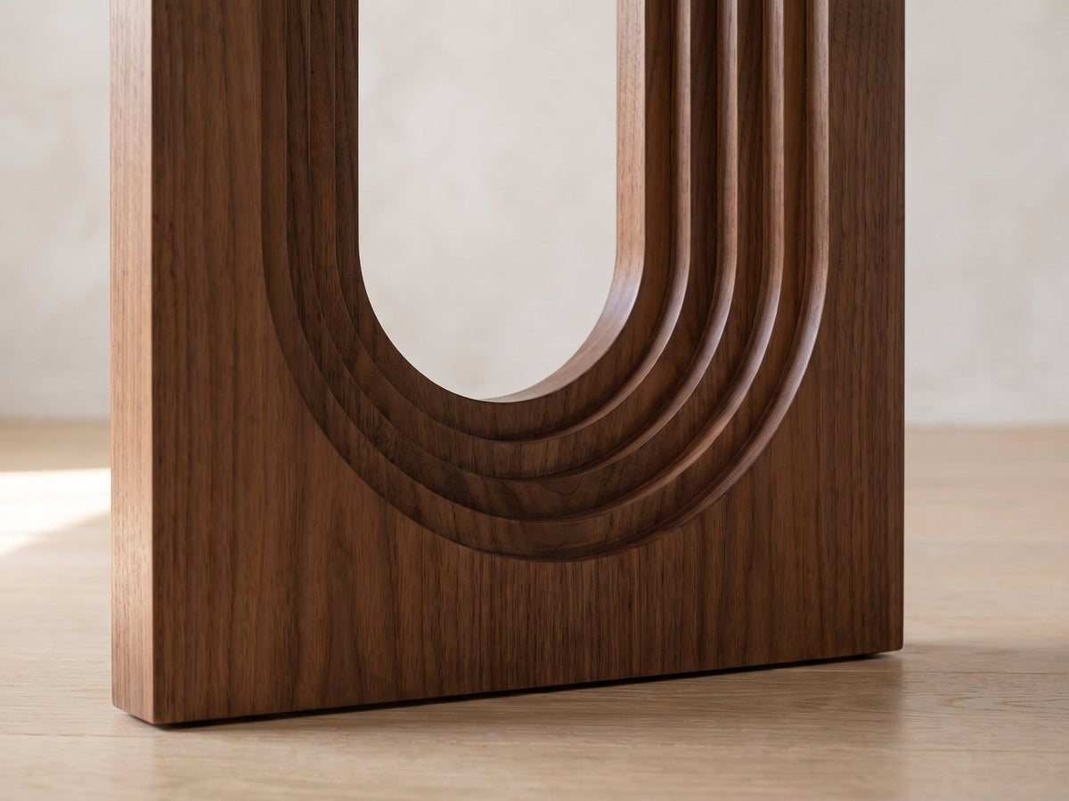 Close-up of the Corato Walnut Veneer Pedestal Console Table: the four stepped rings around the opening in the walnut pedestal