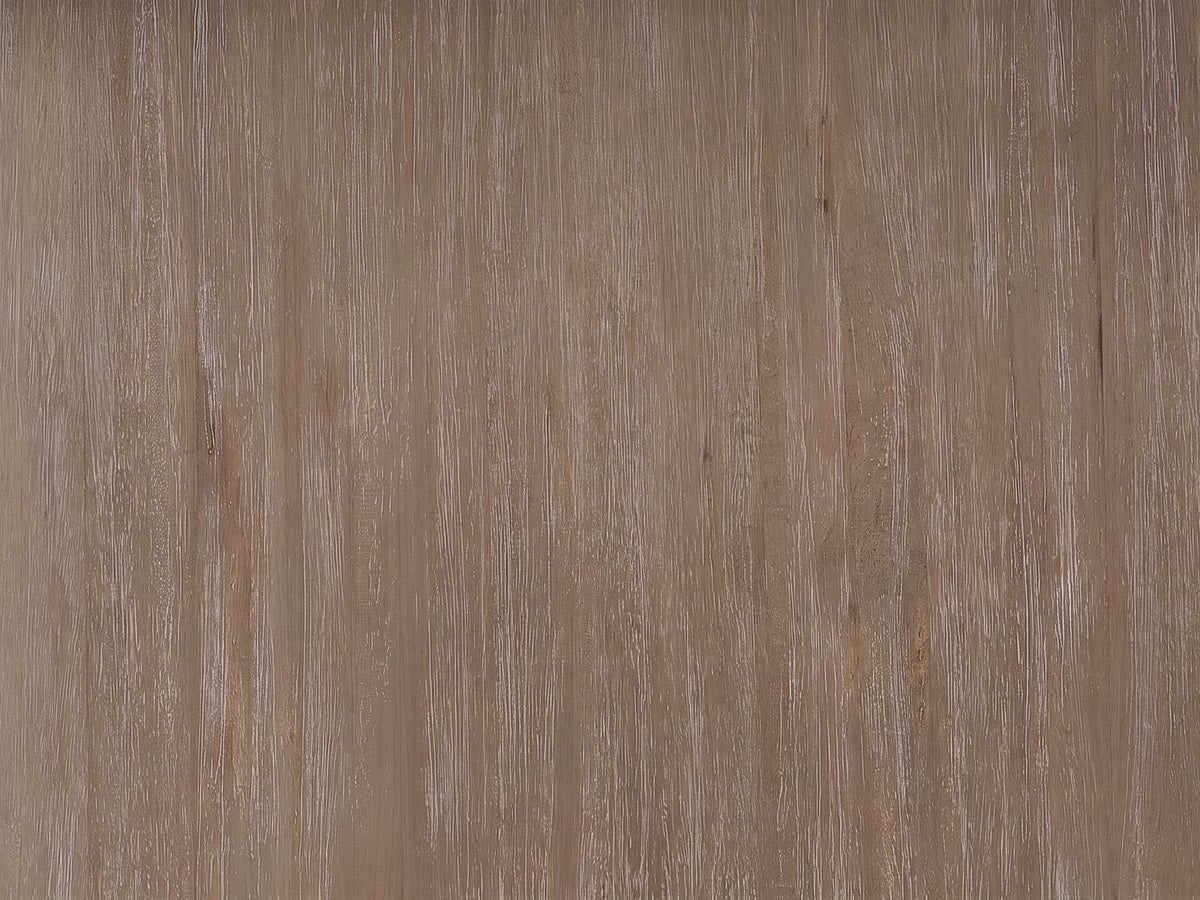 Close-up of the Cotronei 84-Inch Oval Cocoa Wood Veneer Pedestal Dining Table: the cerused cocoa wood veneer grain
