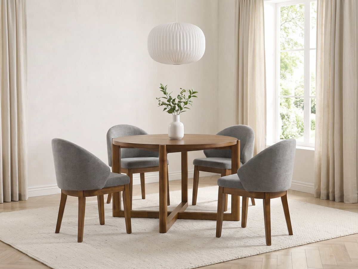 Crucoli 47-Inch Round Walnut-Finish Dining Set with 4 Chairs in a bright plaster dining room with linen curtains