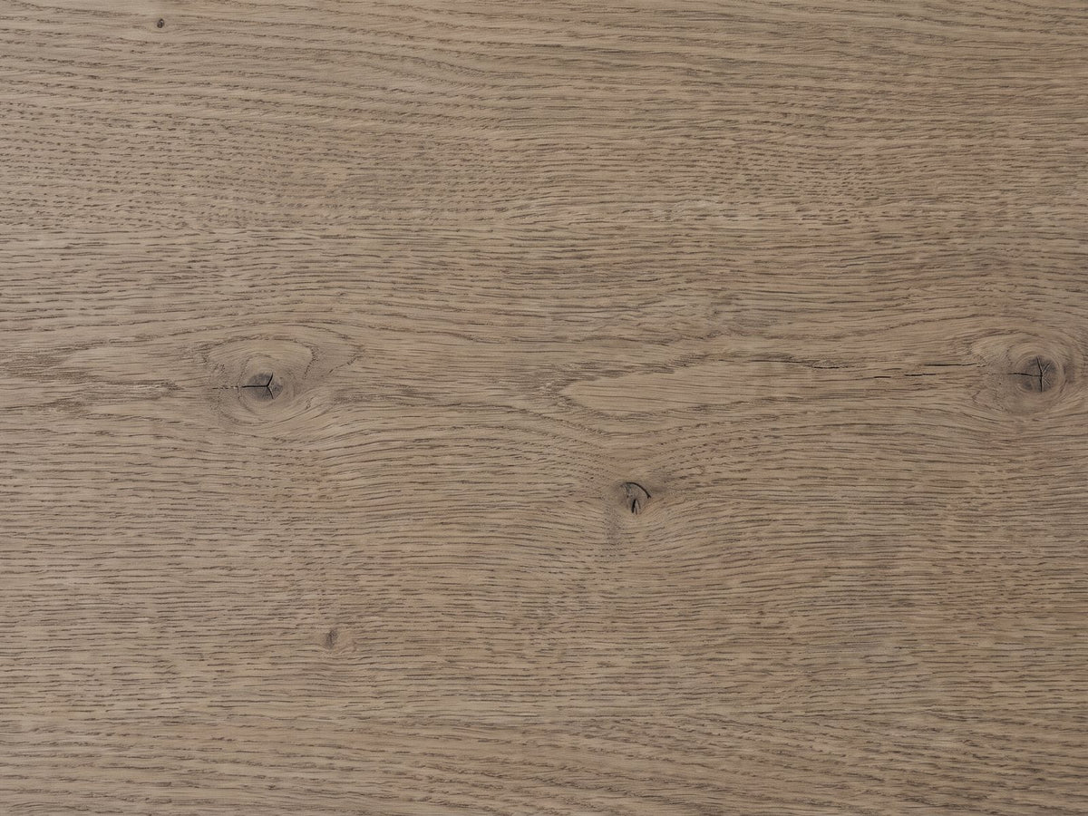 Close-up of the Fonzaso 66-Inch Weathered Knotty Oak 6-Drawer Dresser: the weathered knotty oak grain of a drawer front