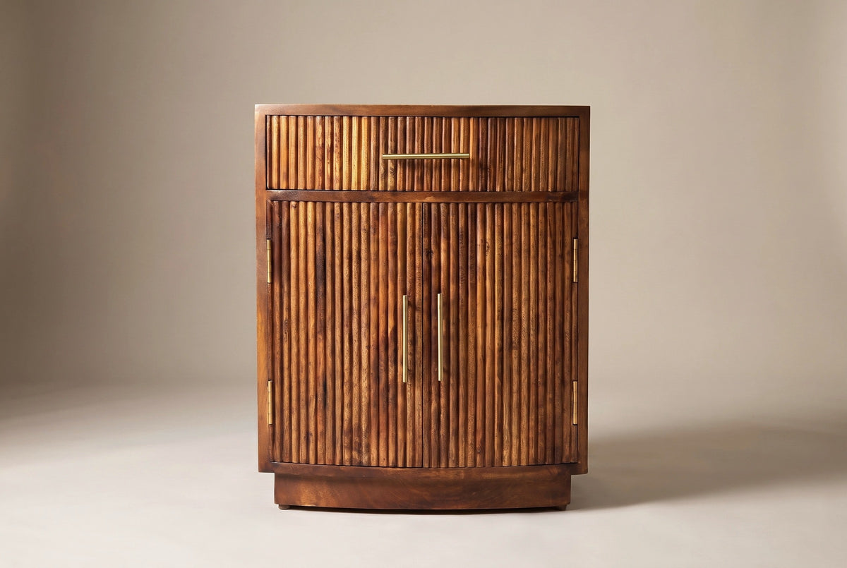 The Gavoi nightstand in mocha mango, front view on a light studio backdrop