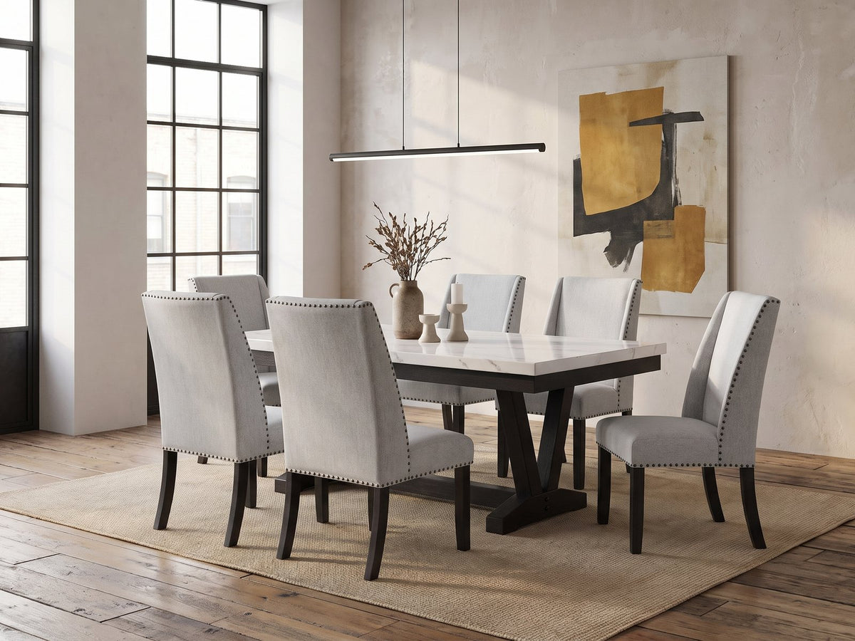 Gerace 72-Inch White Marble V-Trestle Dining Set with 6 Chairs in an industrial loft dining area