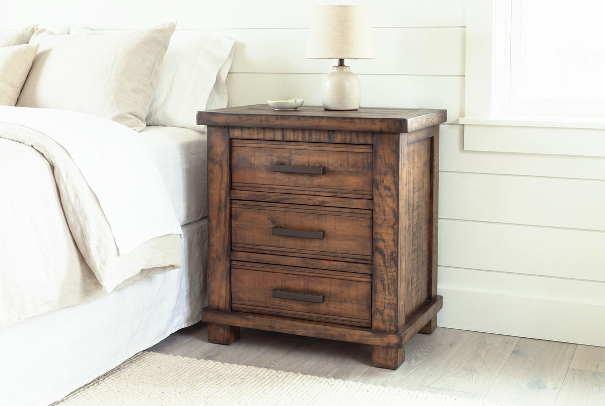 Ittiri reclaimed pine nightstand with a ceramic lamp against white shiplap boarding in a Jackson Hole bedroom with a pale oak floor and a wool rug