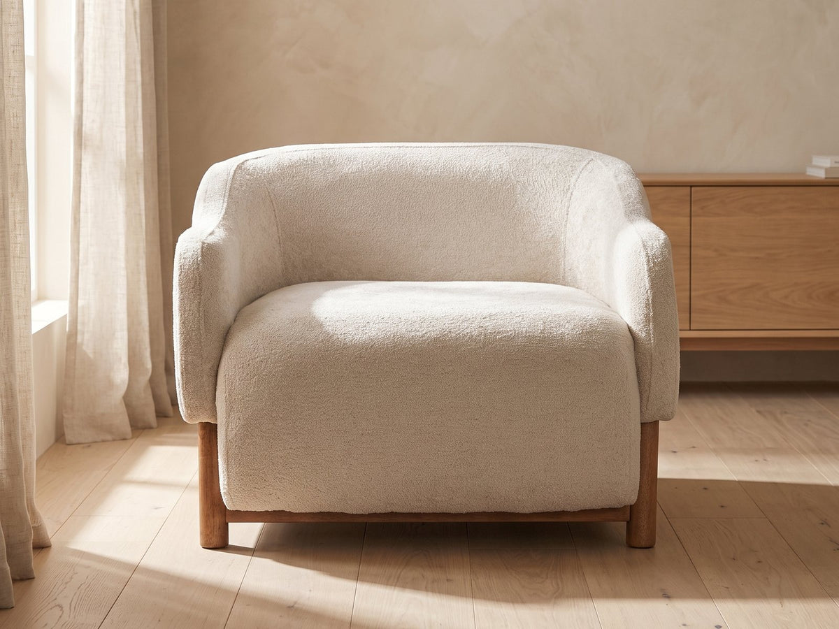 Lido Curved Shell Lounge Chair in a bright interior