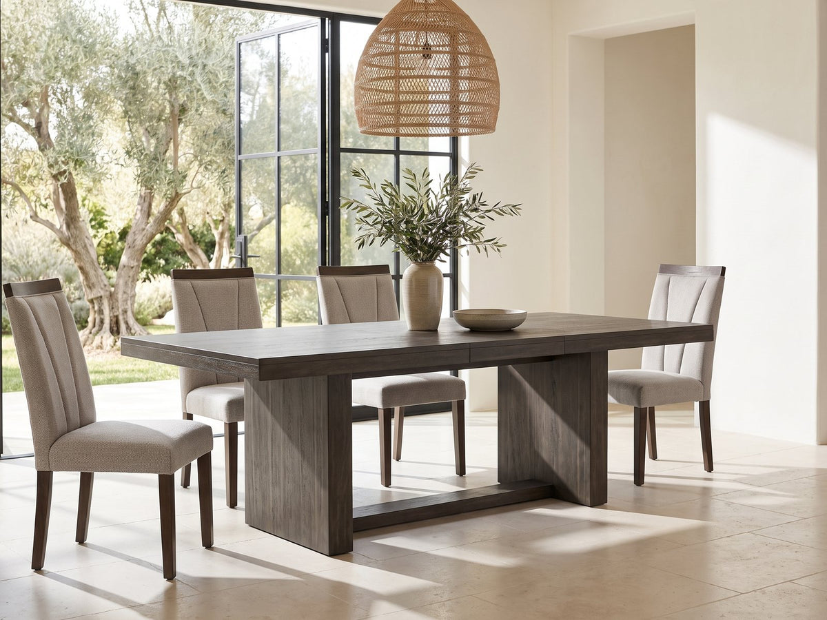 Mormanno 76 to 96-Inch Extending Brown Acacia Dining Set with 4 Chairs in a sunlit villa dining area with olive trees outside