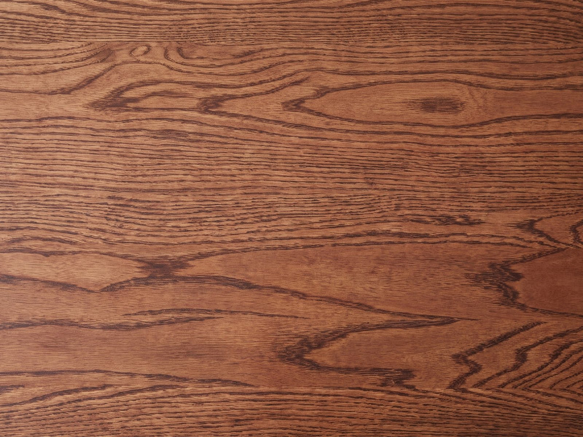 Close-up of the Neive 47-Inch Oval Walnut-Stained Solid Oak Coffee Table with 2 Drawers: the walnut-stained oak grain of the top