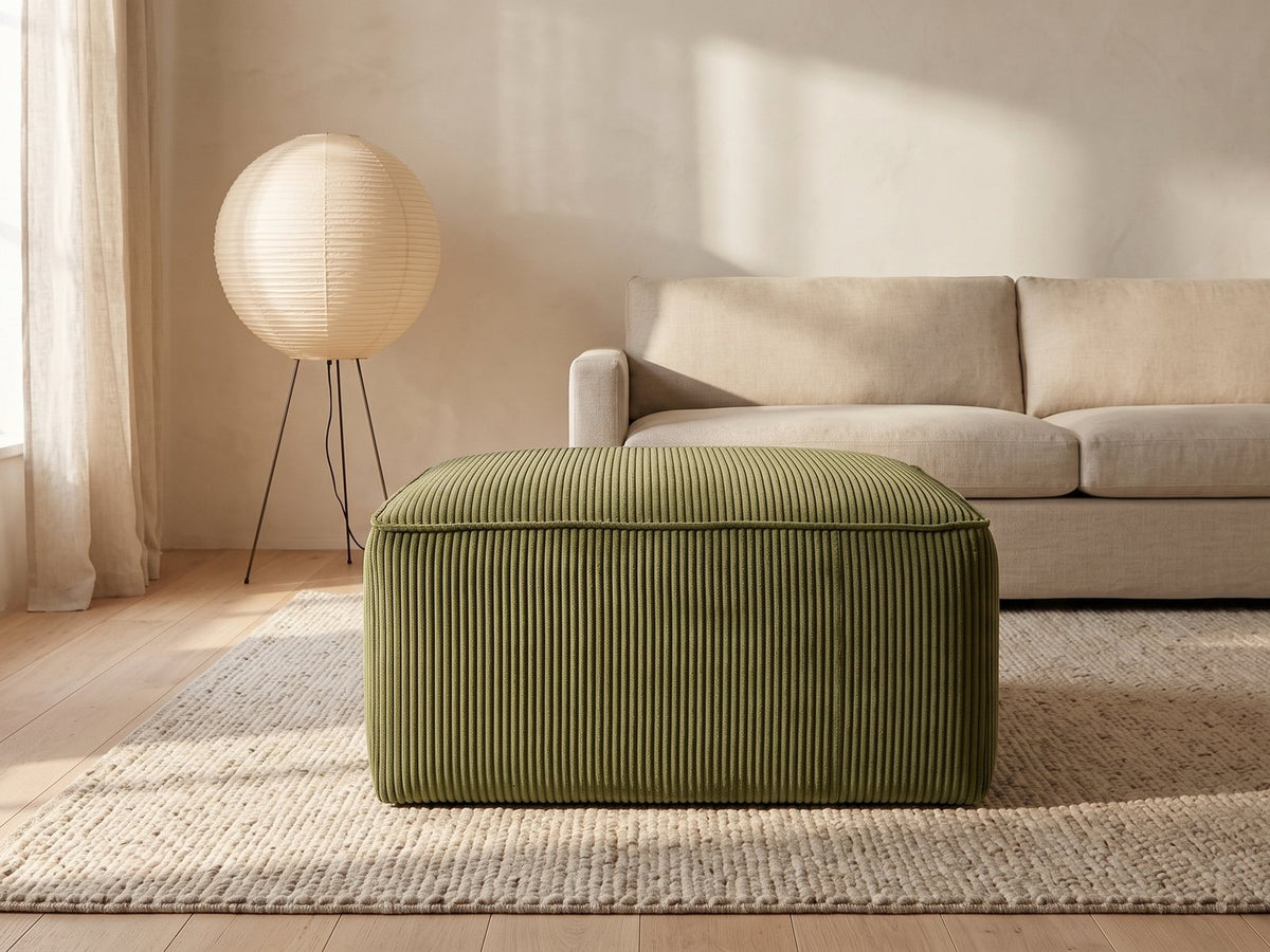 Orvieto Corduroy Cocktail Ottoman in a furnished room