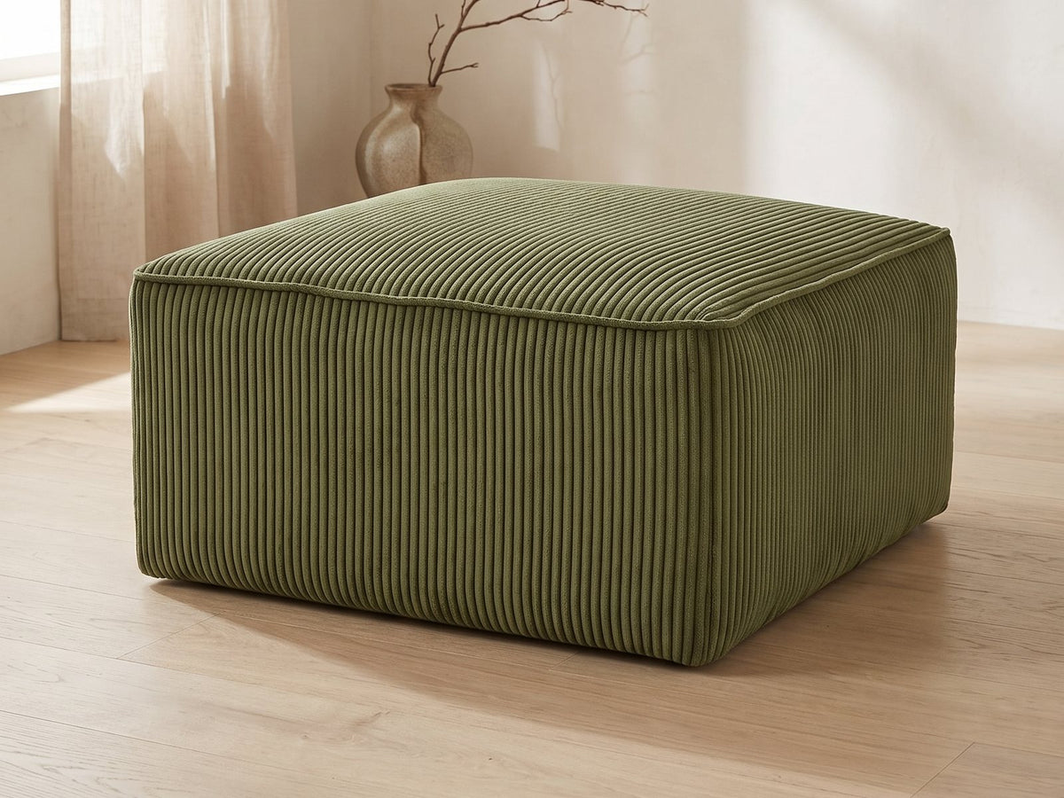 Orvieto Corduroy Cocktail Ottoman in a bright interior