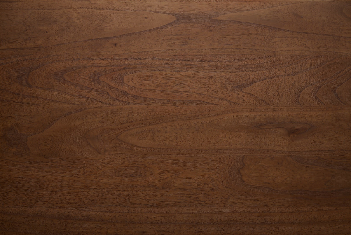 Close-up of the solid neem grain on the Palau nightstand: flowing figure, small knots and fine pores in a warm medium brown