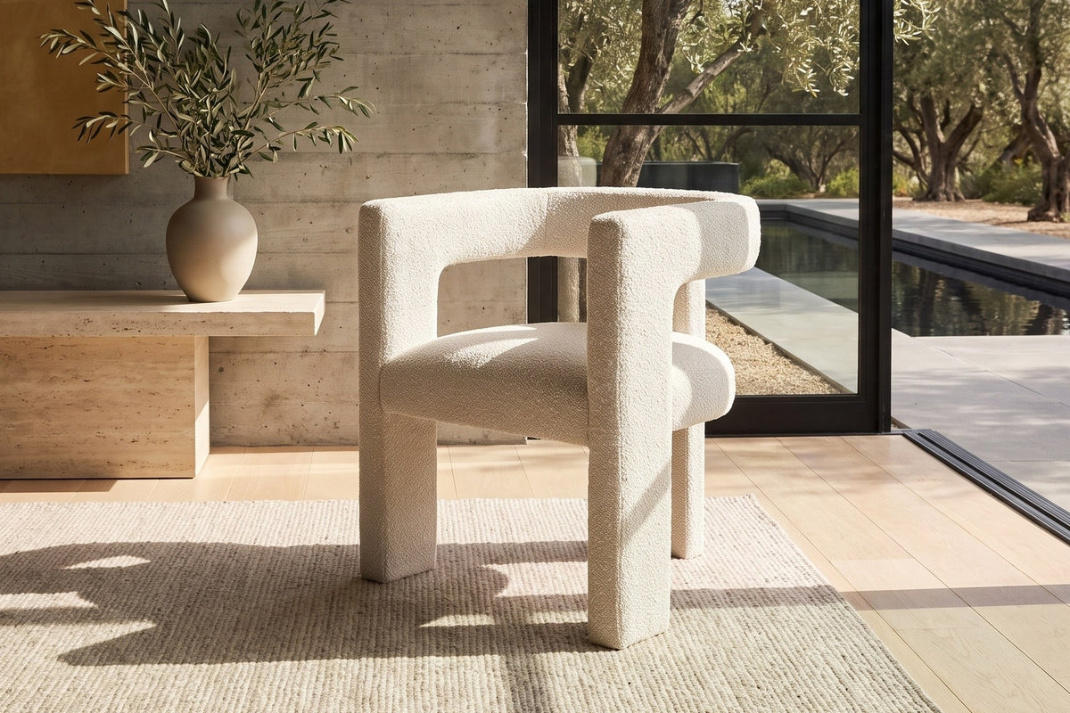 Palermiti Three-Leg Boucle Dining Chair in a sunlit villa dining room