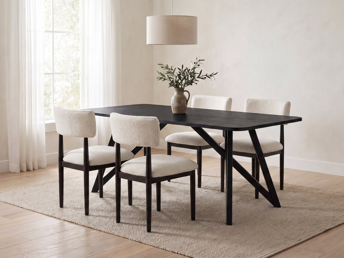 Palmi 70-Inch Black Oak Veneer Dining Set with 4 Boucle Chairs in a calm Scandinavian dining room on a wool rug