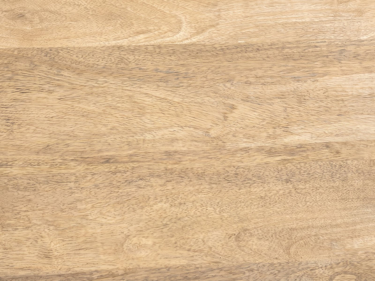 Close-up of the Pievepelago Natural Mango Fluted Drum Side Table: the natural mango grain of the top