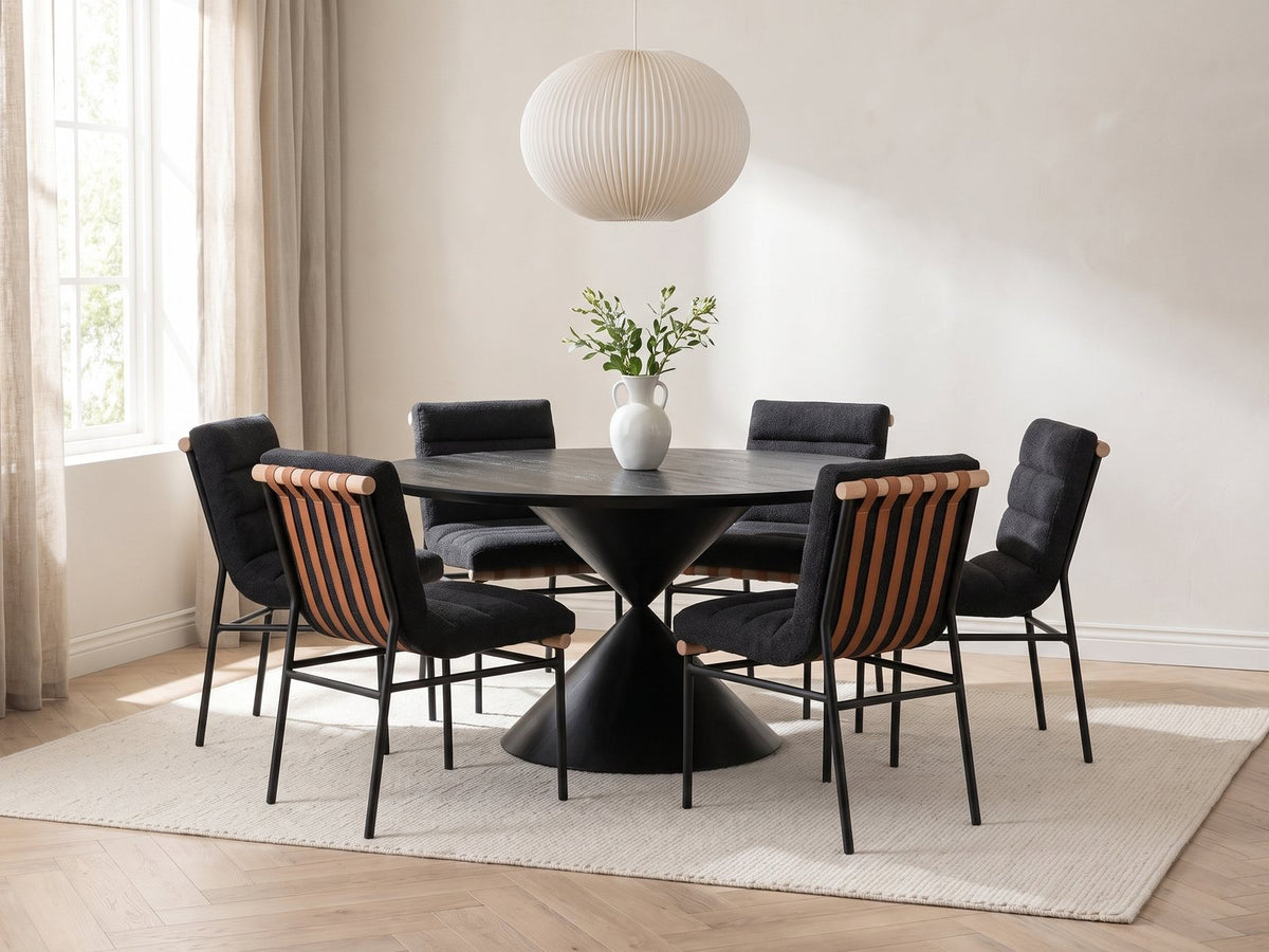 Rende 59-Inch Round Black Oak Hourglass Dining Set with 6 Chairs in a bright plaster dining room with linen curtains