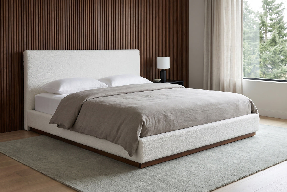 Roccascalegna bed against a fluted dark walnut panelled wall in a Seattle bedroom