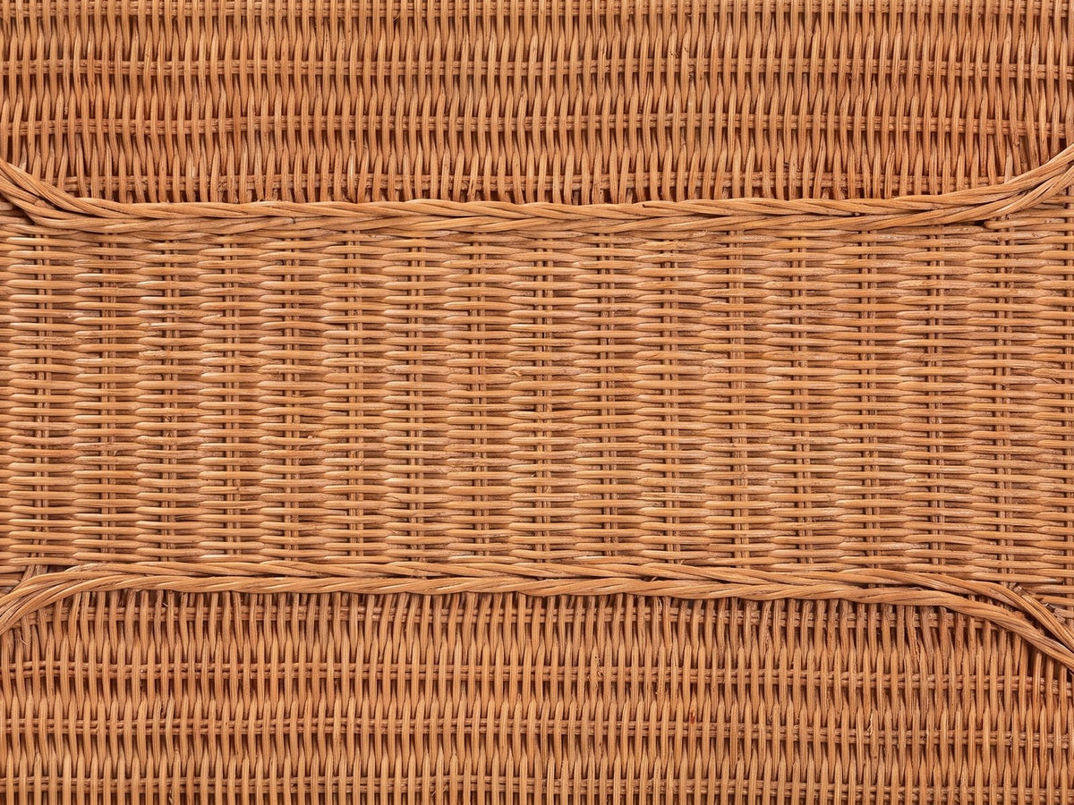 Close-up of the Rutigliano Braided Rattan Two-Tier Side Table: the woven rattan panels of the top