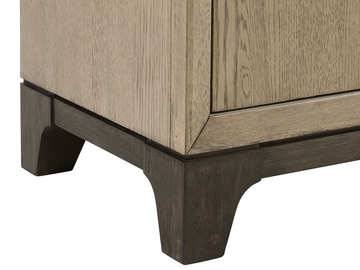 Close-up of the Sappada 54-Inch Caramel Oak and Cocoa 12-Drawer Chest: base