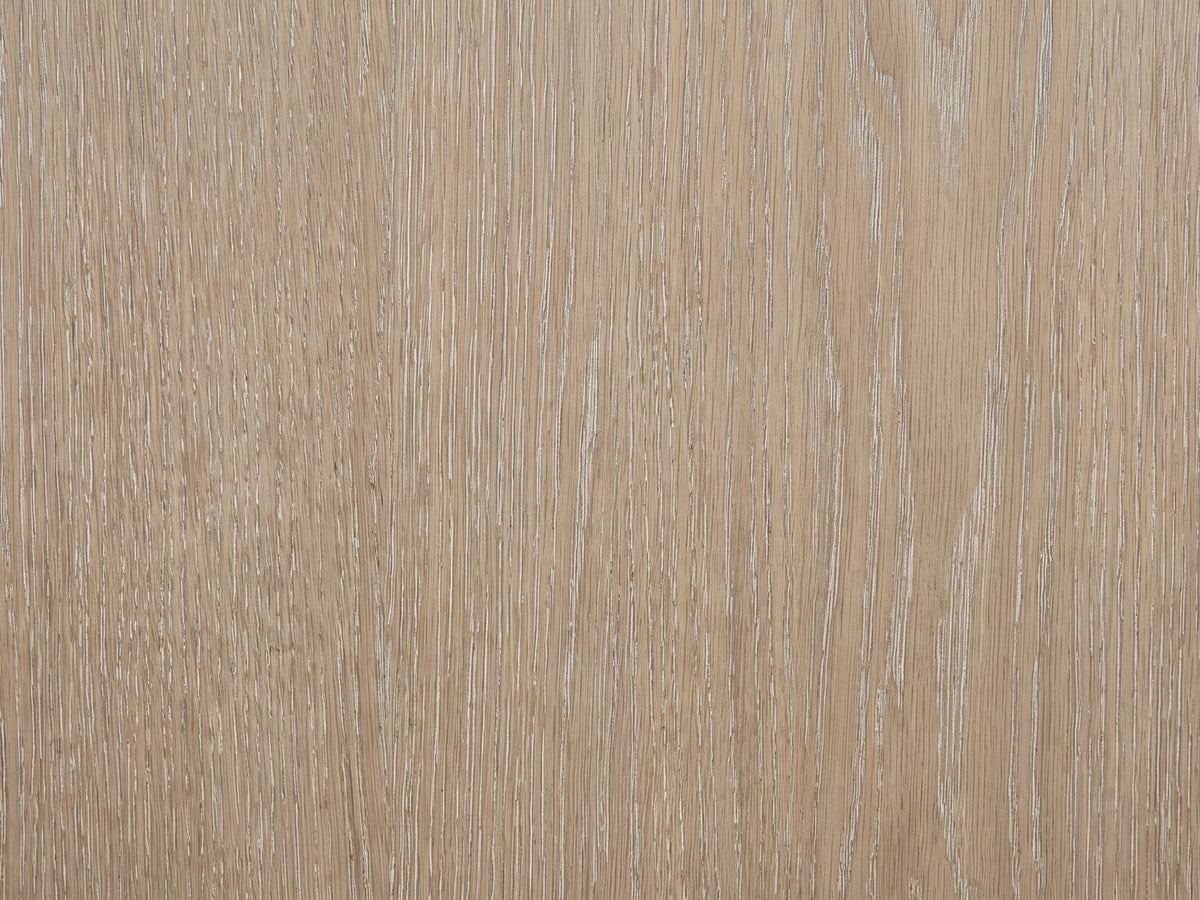 Close-up of the Schio 66.5-Inch Toffee 6-Drawer Dresser: the cerused oak grain, its open pores filled pale