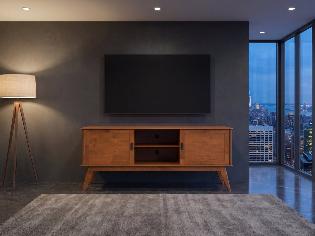 Senigallia Low Mid-Century Media Console under a wall-mounted screen in a city penthouse at blue hour