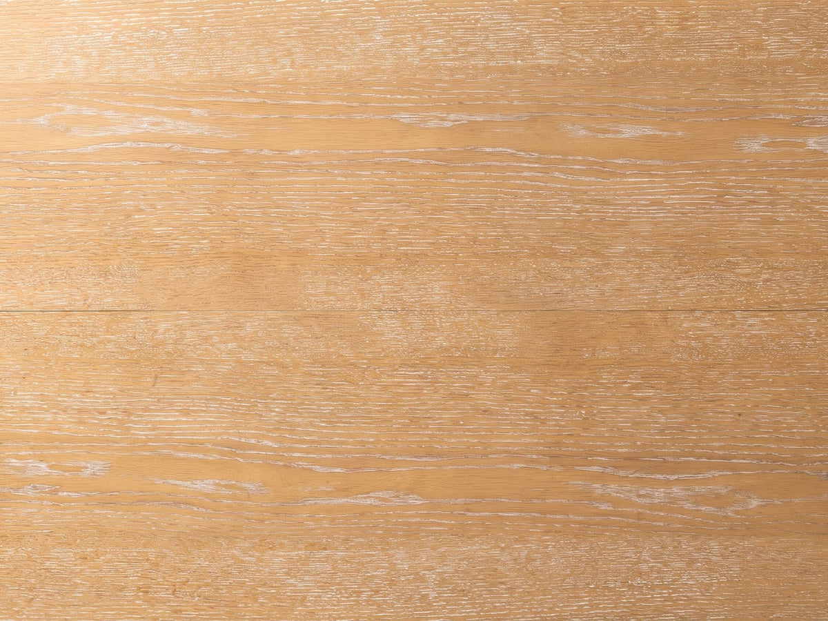 Close-up of the Siderno 42-Inch Extending Round Dining Set with 4 Chairs: the limed oak veneer top