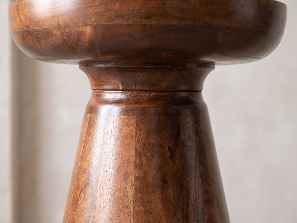 Close-up of the Specchia Brown Mango Cone Pedestal Side Table: the rounded cap over the turned neck and cone