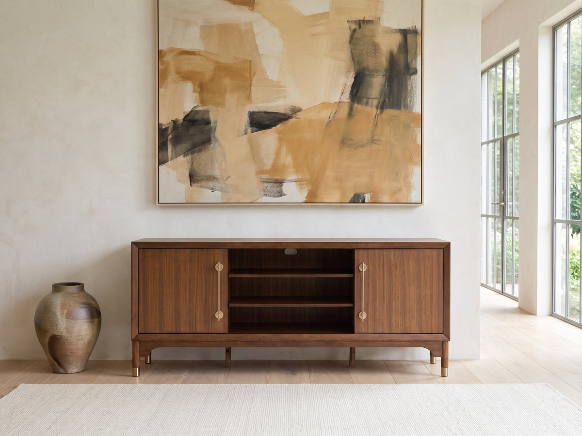 Stresa Walnut Media Console under a large abstract painting in a bright living room