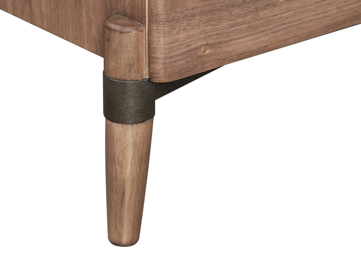 Close-up of the Torcello 68-Inch Walnut 6-Drawer Dresser: leg