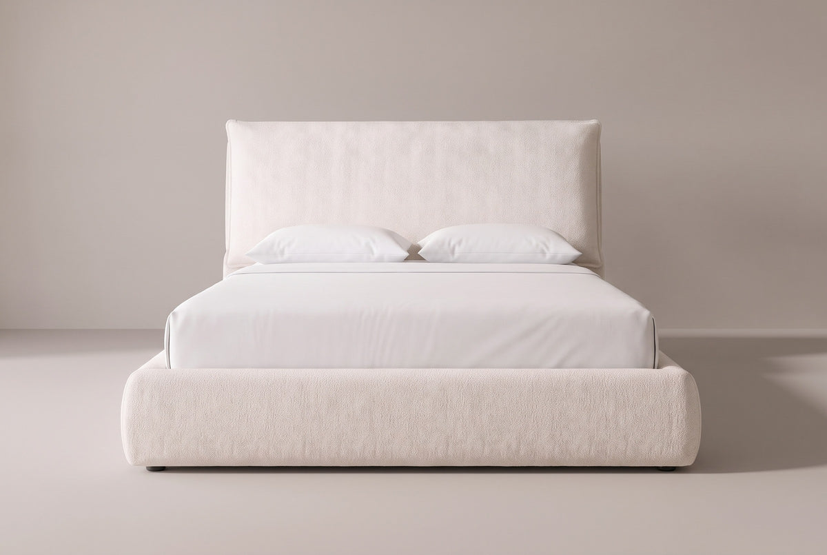 Trivento cream white chenille bed with a white mattress and pillows (not included), front view