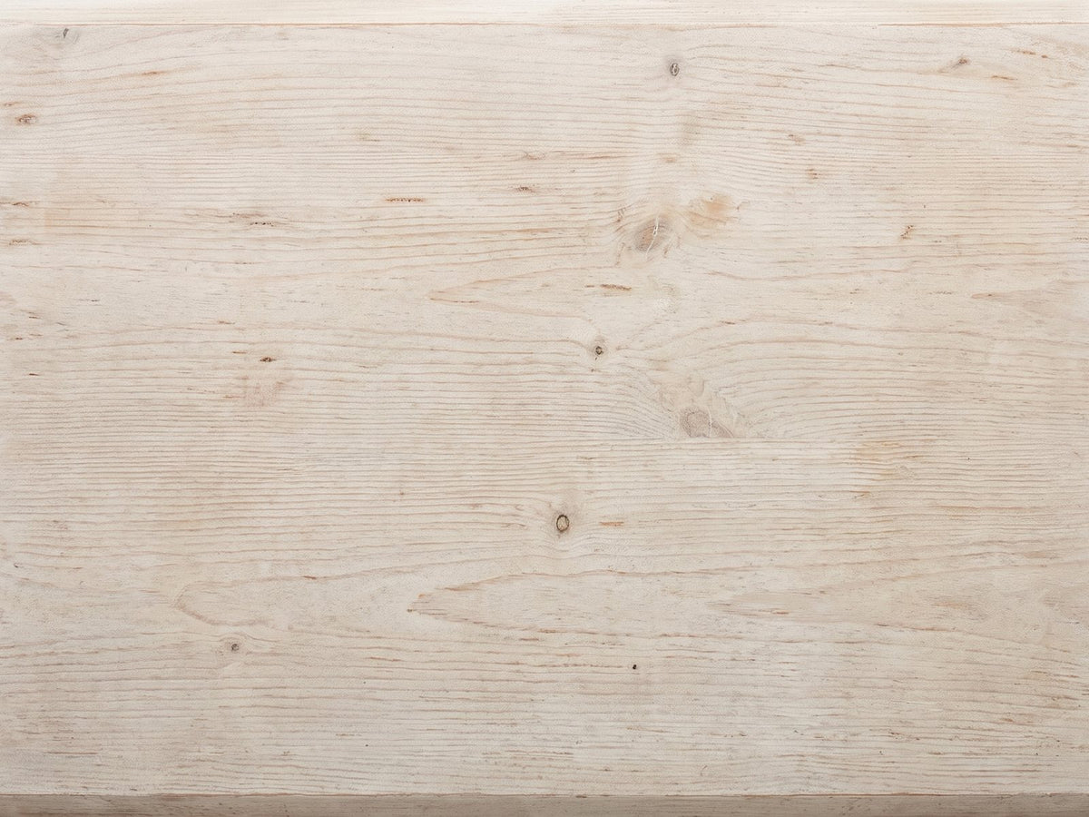 Close-up of the Varallo Reclaimed Pine Side Table: the whitewashed reclaimed pine grain of the top