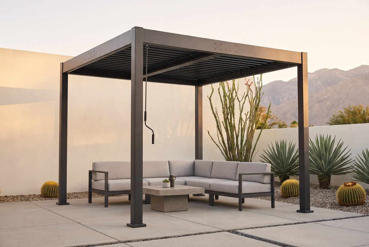 Zingaro black louvered pergola over a concrete patio in a Palm Springs desert garden with a white stucco wall, agave and the San Jacinto mountains (furniture not included)