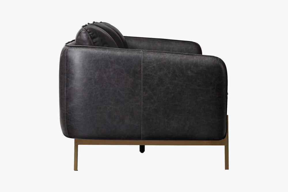 Left-Side Back View of A Mid-Century Modern, Black, Three Seats, Top Grain Leather Sofa on a White Background.