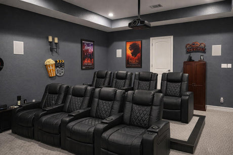 A home theater room with two rows of Valencia recliners arranged to maximize seating capacity