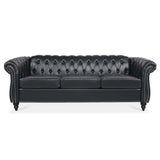 Black faux-leather Chesterfield three-seat sofa, front view