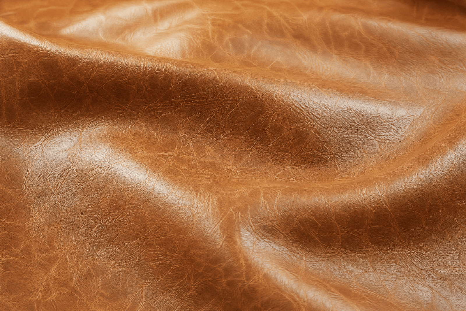 Close view of distressed leather and tailored stitching
