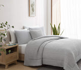 Snug Piped Comforter