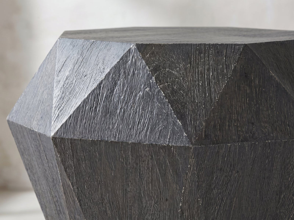 Close-up of the Accadia Grey Mango Faceted Octagon Side Table: the triangular facets of the crown meeting at the widest ridge