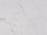 Close-up of the Acerenza White Marble Pedestal Side Table: the white marble top