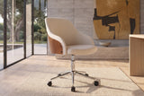 Acri Walnut Bentwood Swivel Desk Chair with Cream Woven Fabric in a sunlit villa study