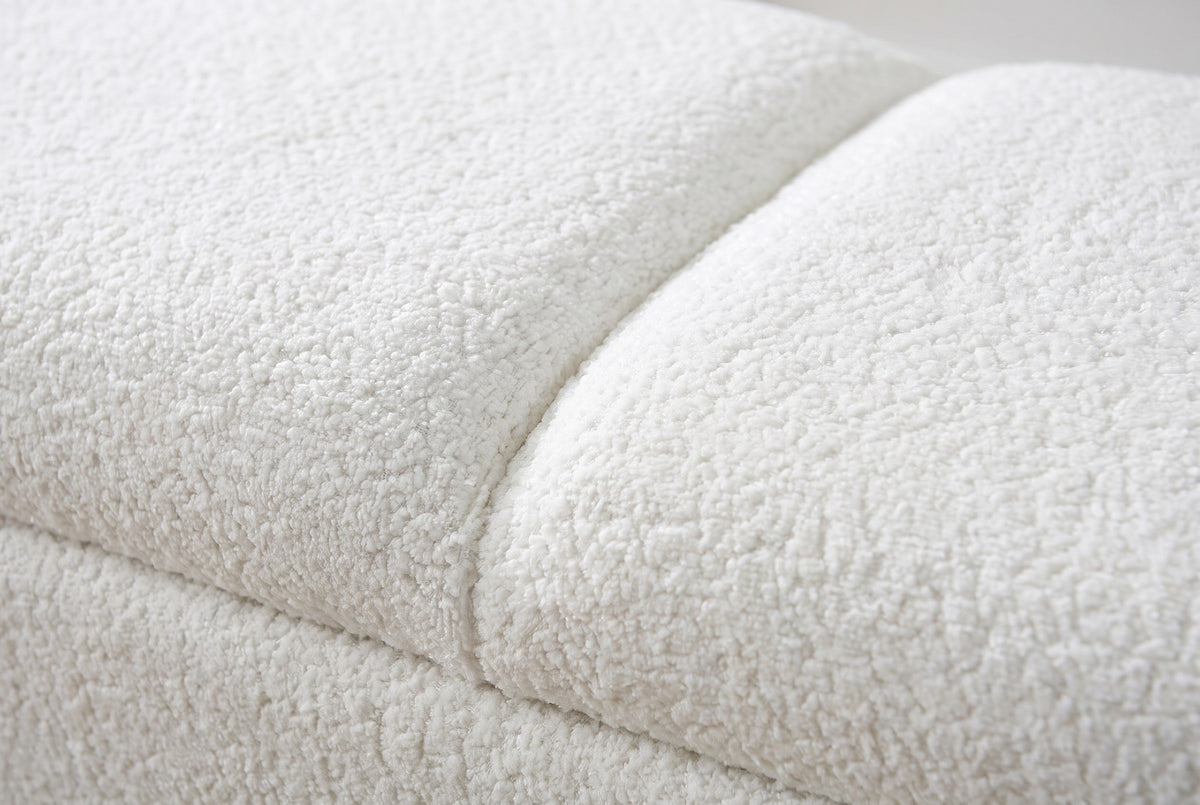 Close-up of the white fabric seat of the Alatri bench: short, dense, nubby pile with a soft seam between two padded sections