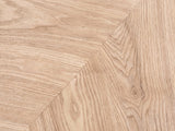Close-up of the Alba 31.5-Inch Round Parquet Wood Veneer Storage Coffee Table: the radial parquet veneer of the lid